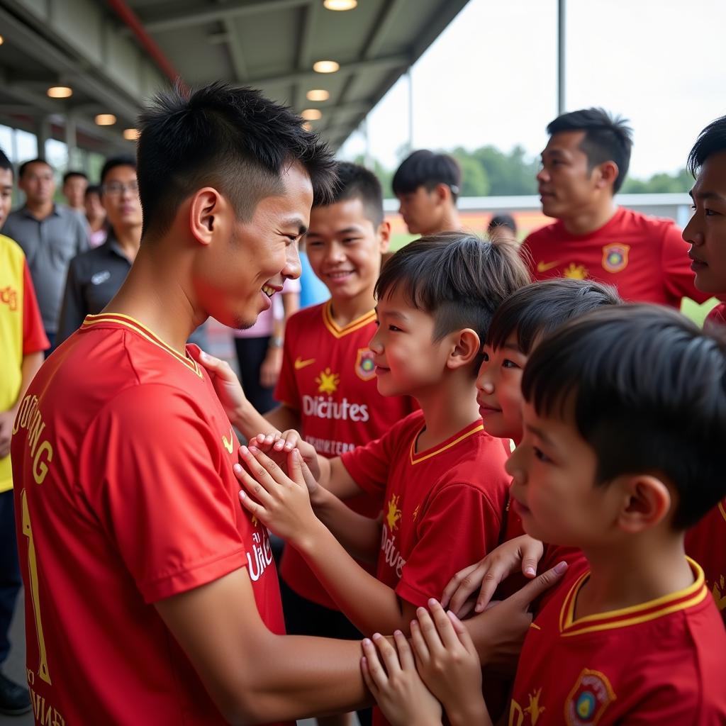 Quang Hai interacting with young fans