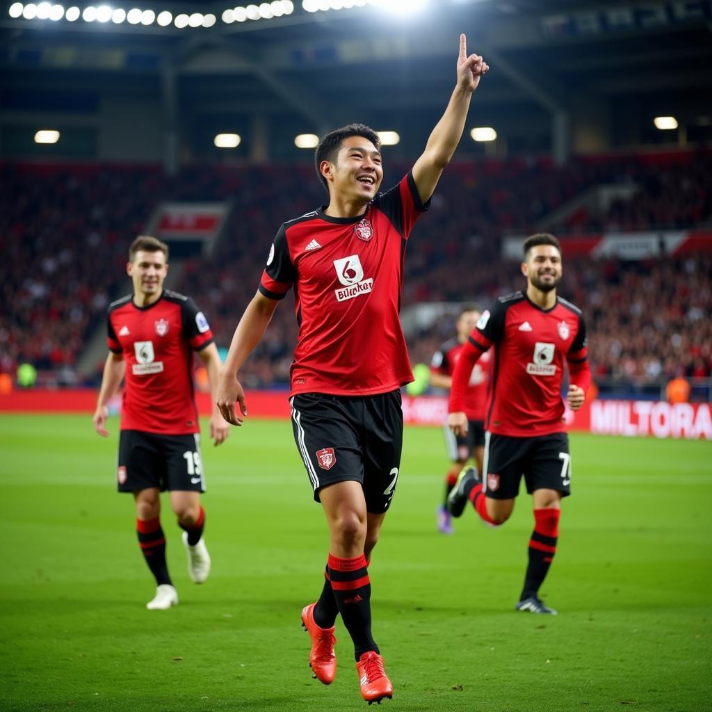 Ritsu Doan Celebrates a Goal for SC Freiburg