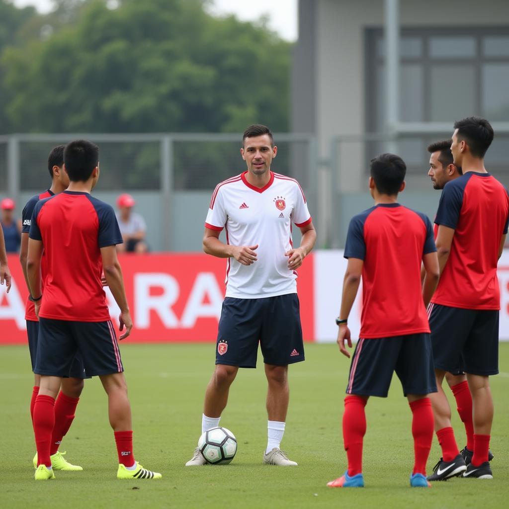 Vietnam U20 Football Coach Providing Instructions