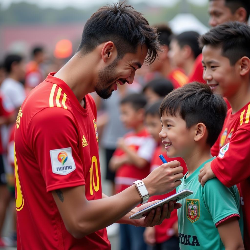 Vietnamese Football Player Signing Autograph for a Young Fan