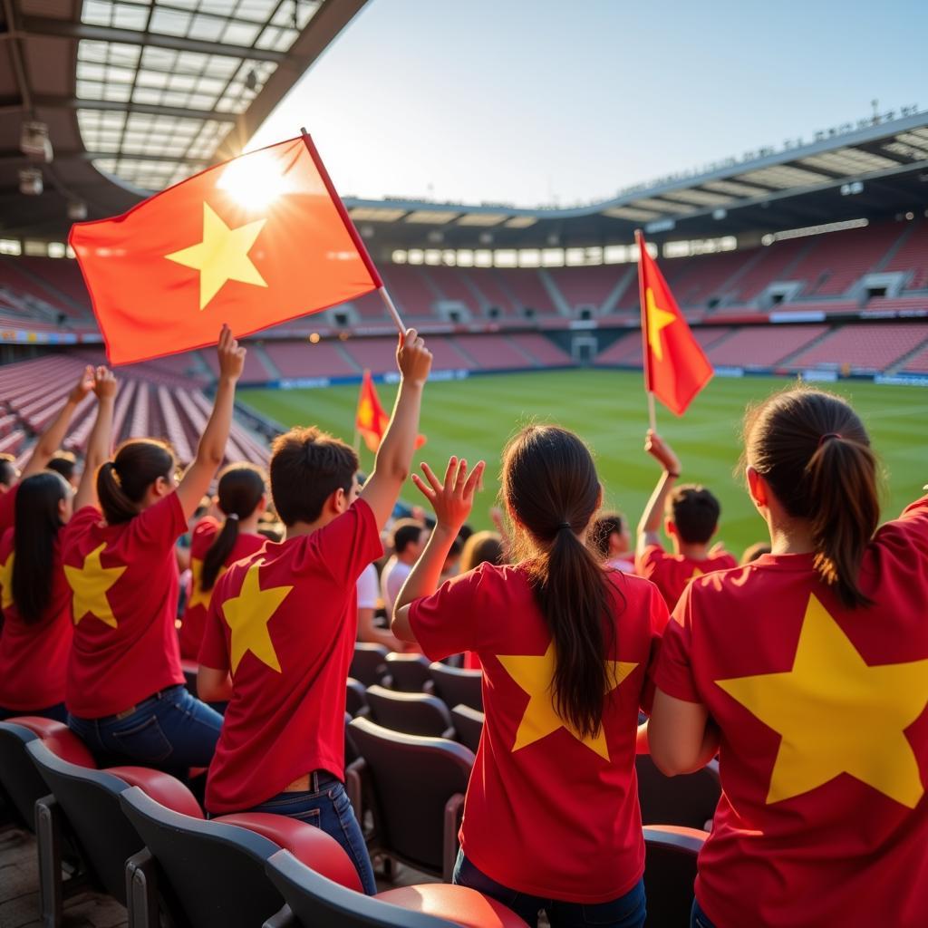 Wives of Vietnamese football players cheering from the stands, showing their support.