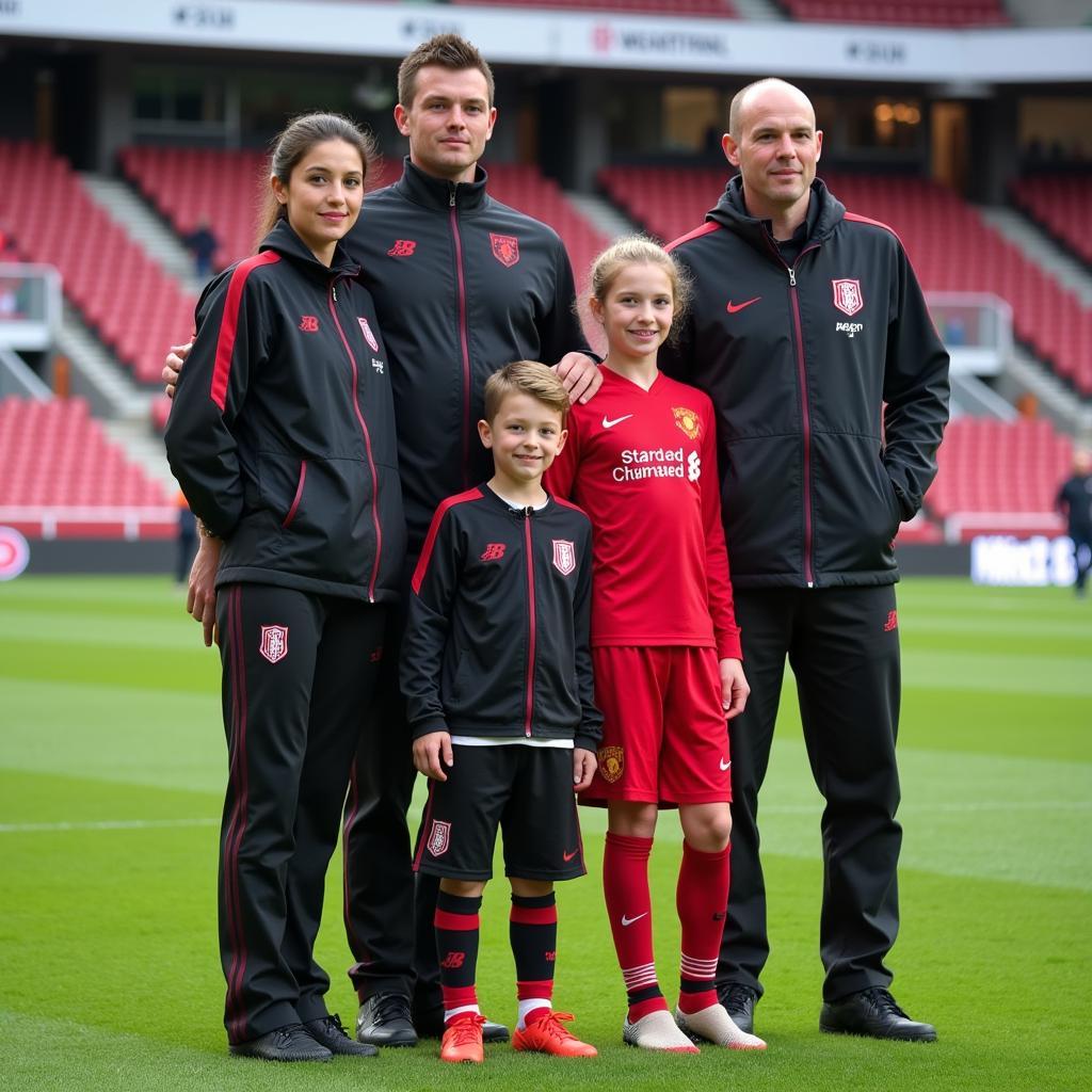 Alfie Haaland with his family, potentially hinting at future football aspirations