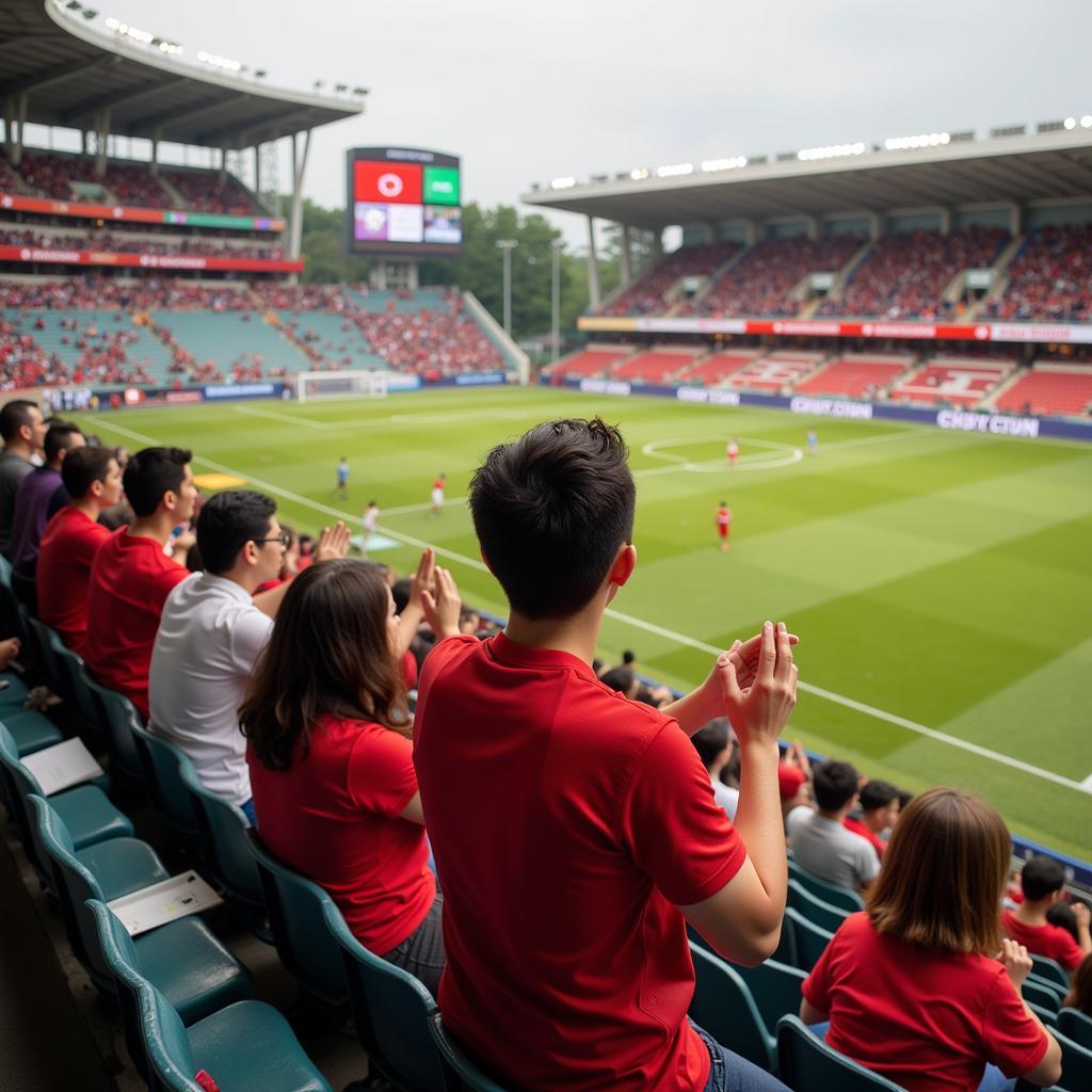 Do Hung Dung's family supporting him at a match