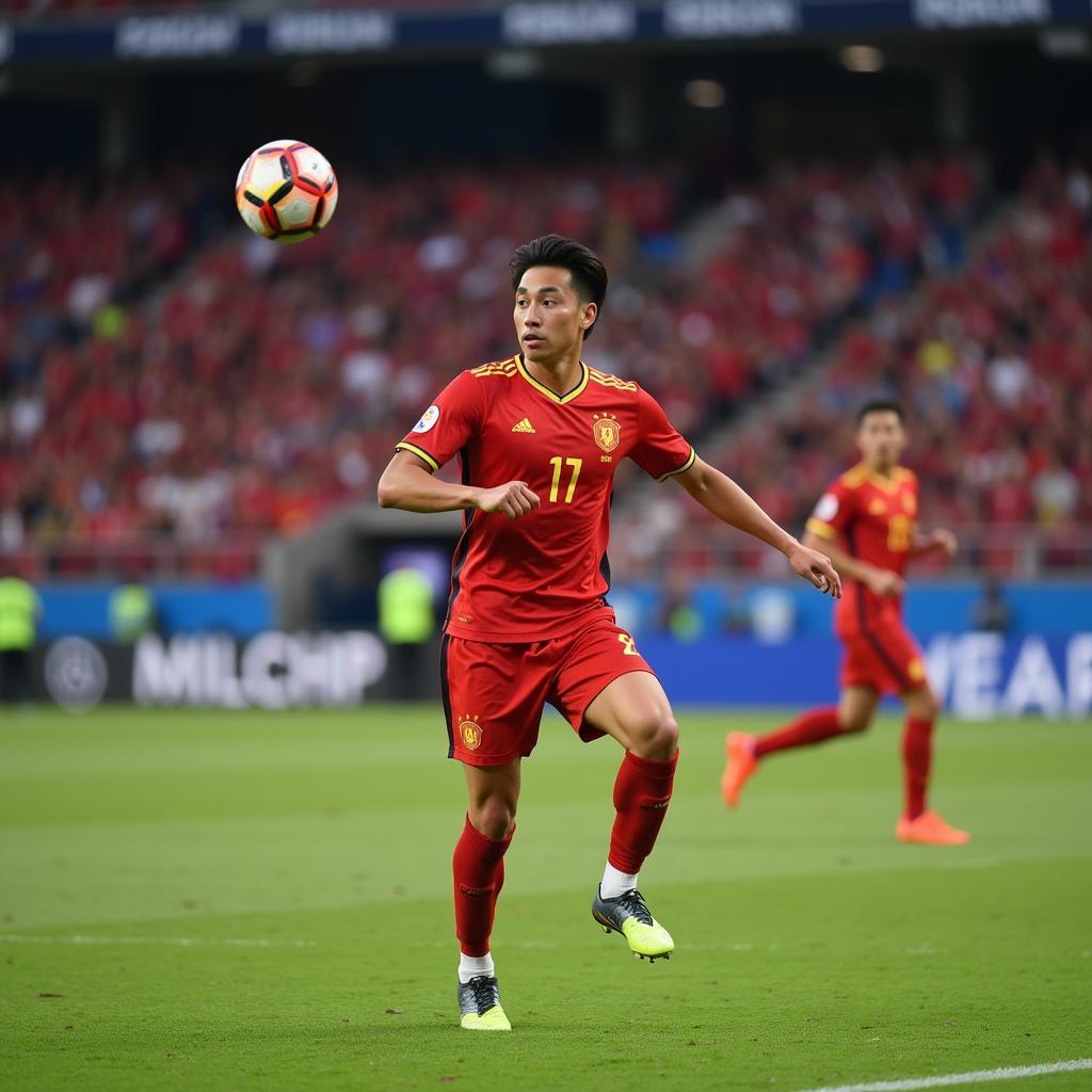 Duc Huy demonstrating precise passing skills during a match with the Vietnam national team.