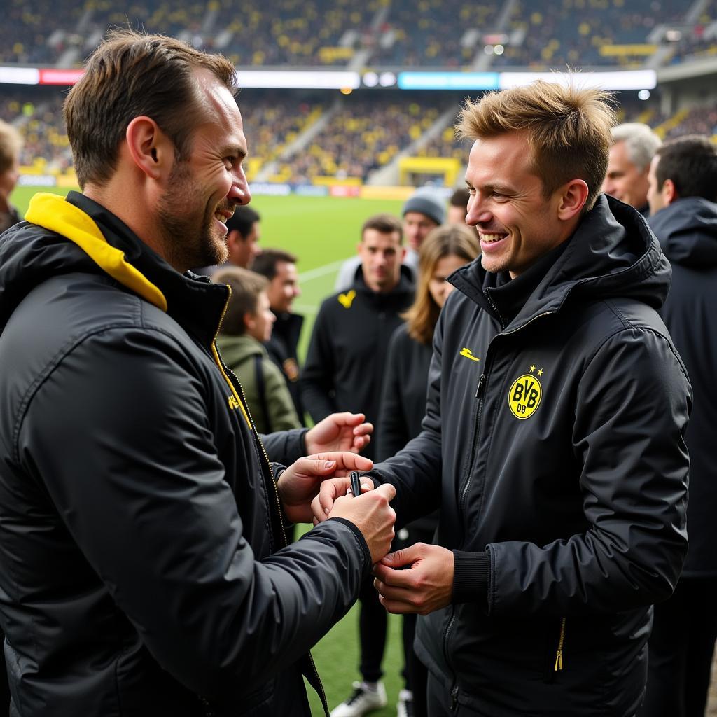 Erling Haaland interacting with Borussia Dortmund fans