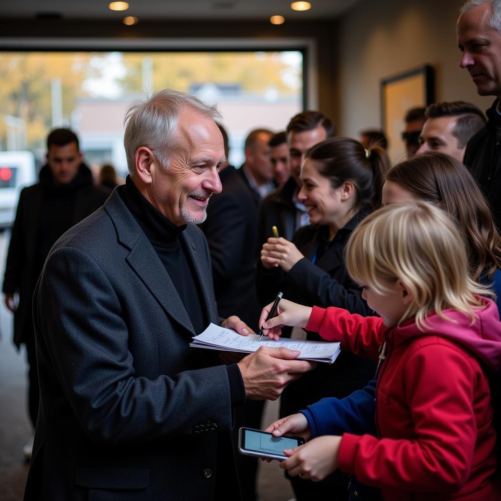 Erling Haaland interacting with fans