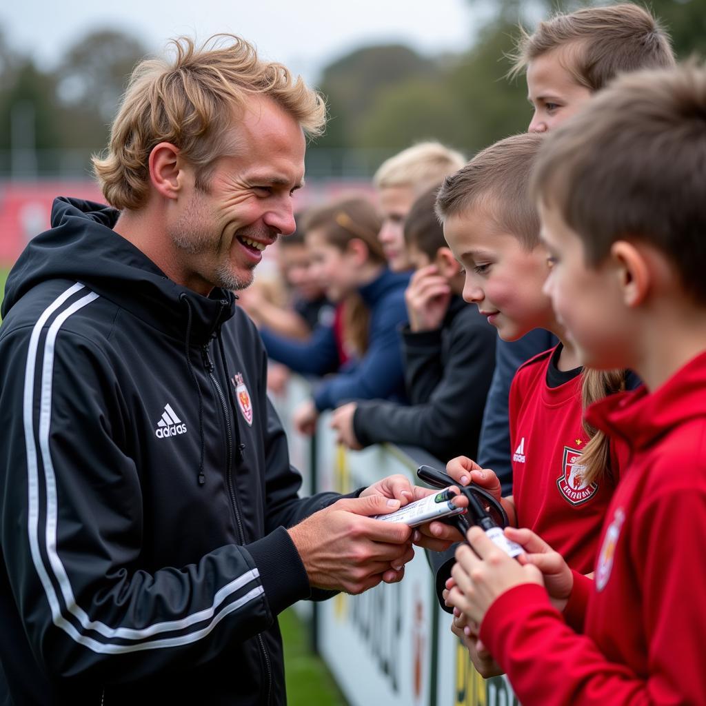 Erling Haaland interacting with young fans