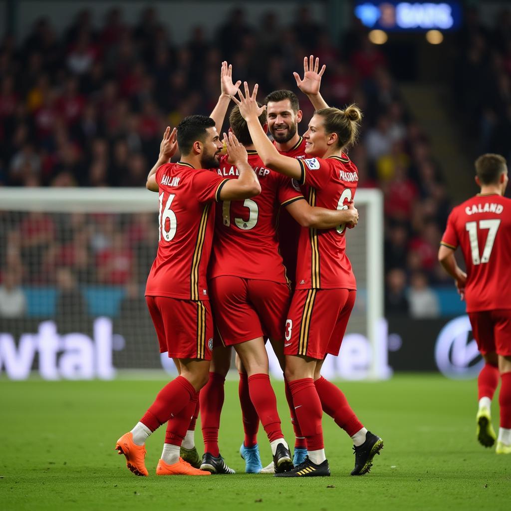 Haaland celebrating a goal with teammates