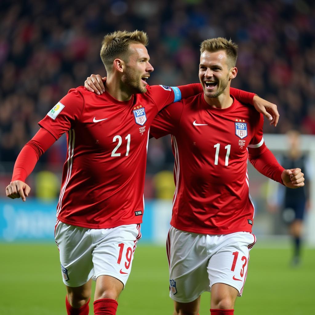 Haaland and Goretzka celebrating a goal