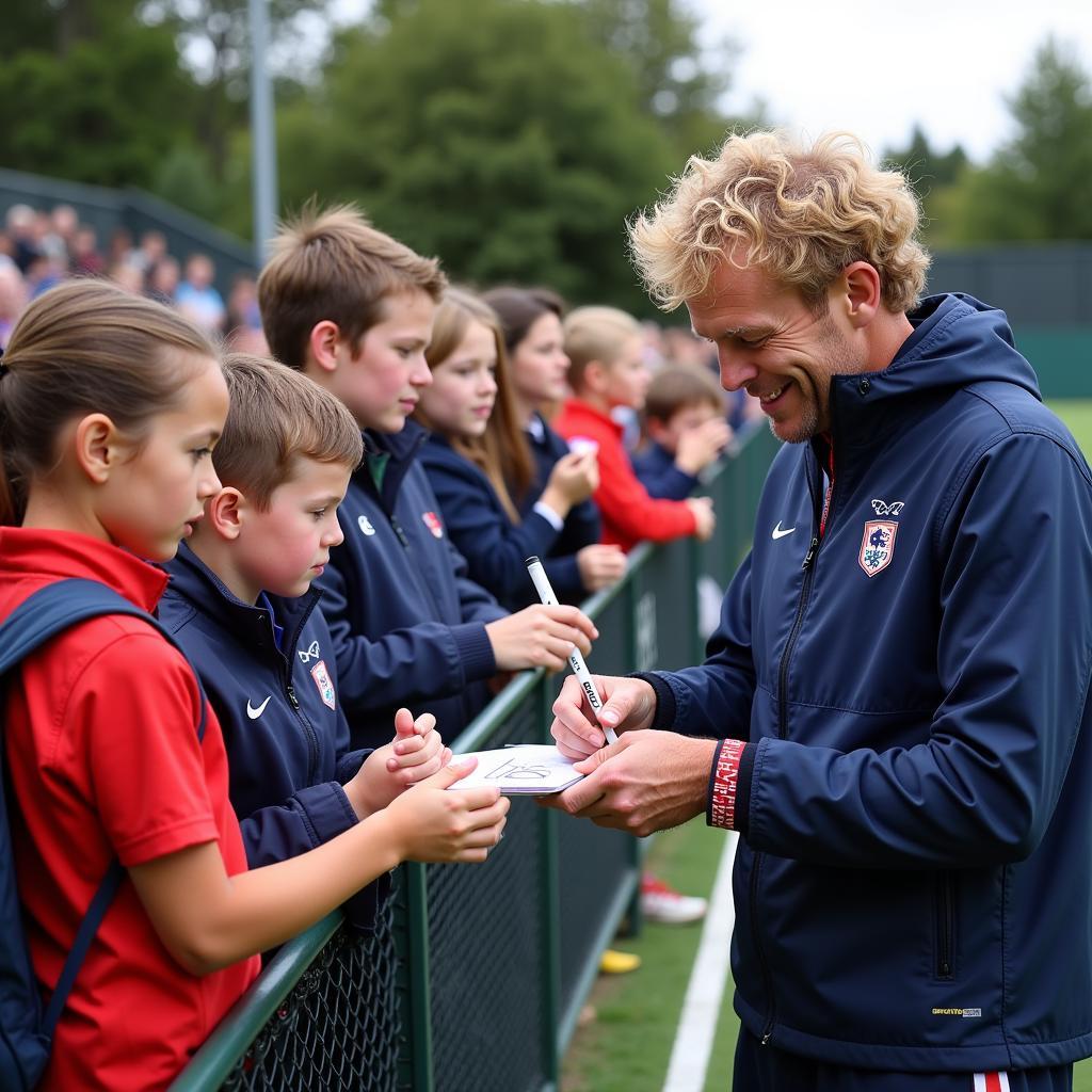 Erling Haaland interacts with young fans