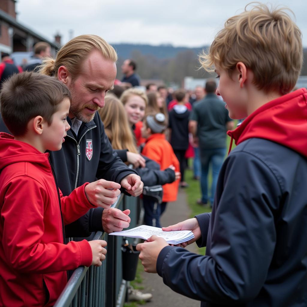 Haaland interacting with young fans