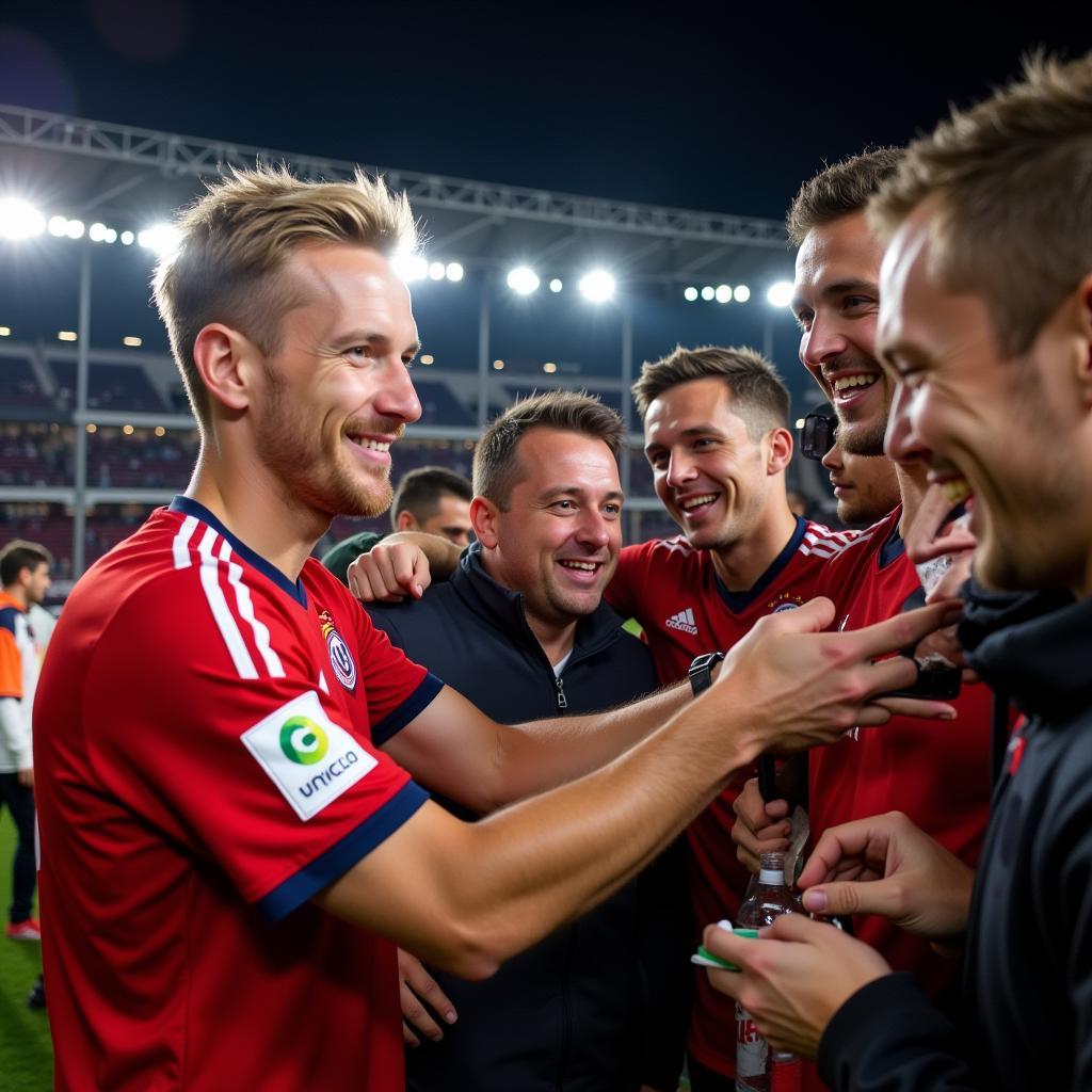 Erling Haaland interacts with Norwegian fans after a Euro qualifier match