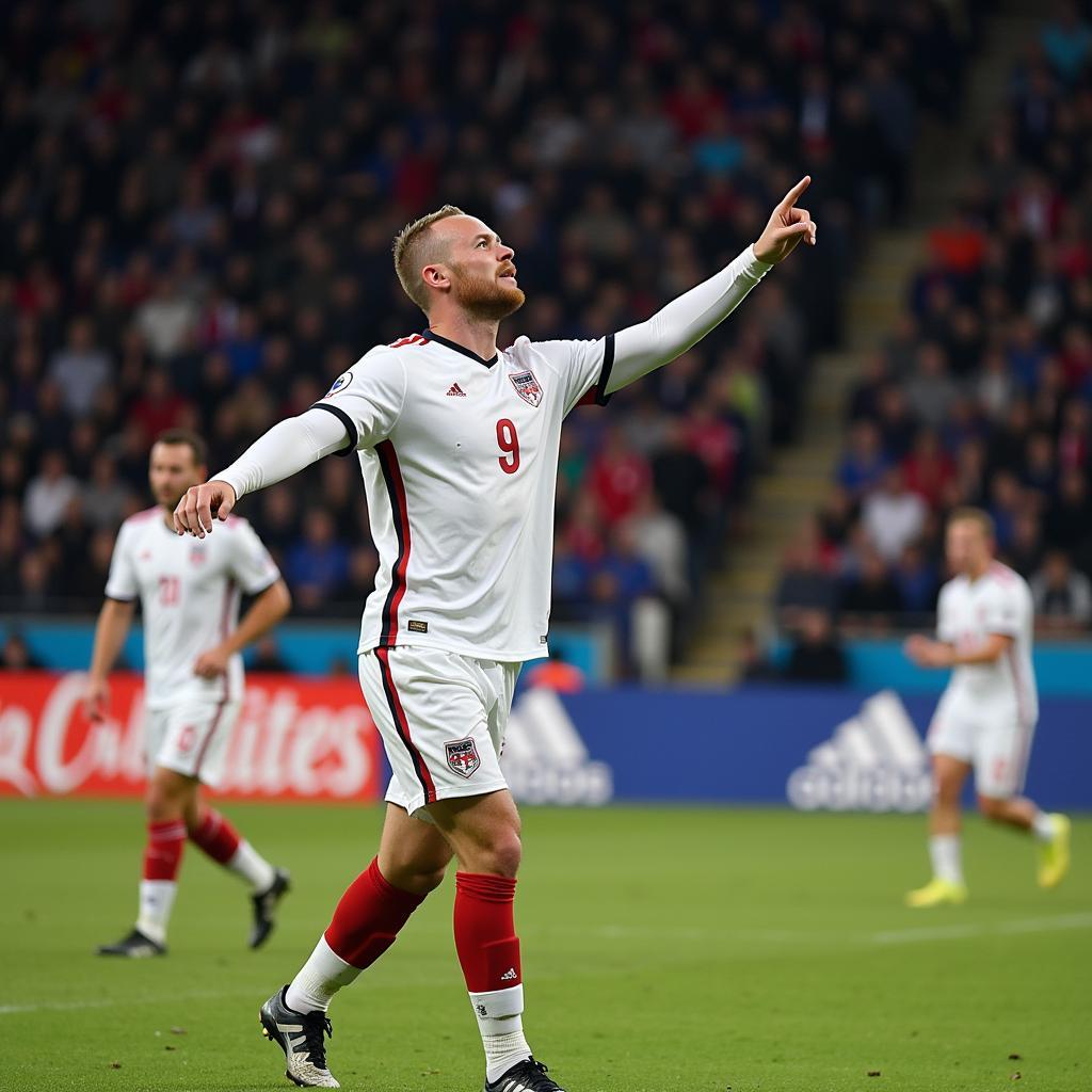 Haaland points to the sky in celebration