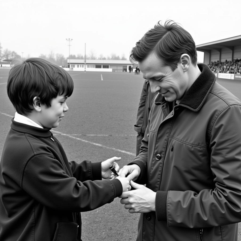 Haaland signing an autograph for an Ashton United fan