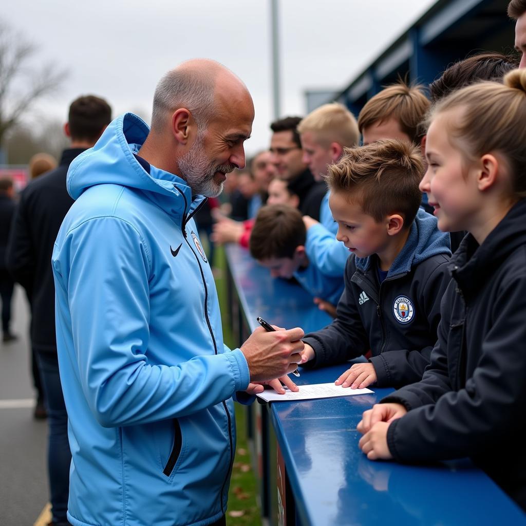 Erling Haaland signing autographs for Man City fans