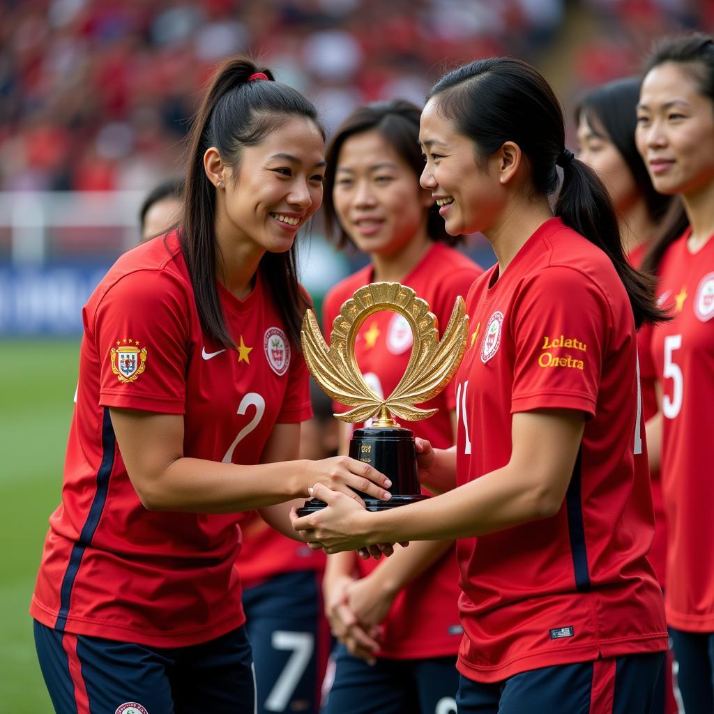 Huynh Nhu is presented with the Vietnam Women's Footballer of the Year award, acknowledging her exceptional contributions to the sport.