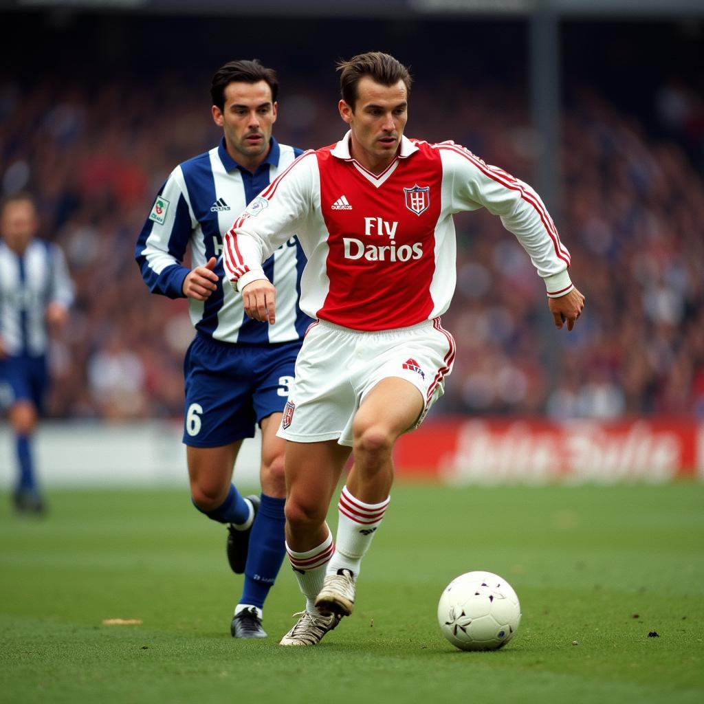 Marc Overmars dribbling past opponents during his time at Ajax.