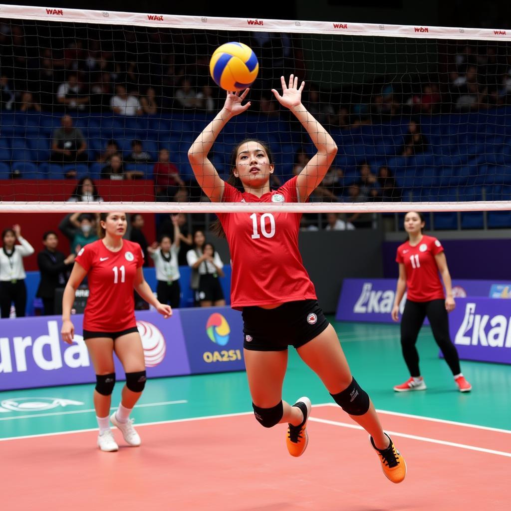 Nguyen Thi Hoa executing a powerful spike during a volleyball match