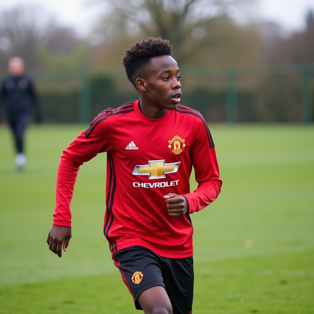 Young Black Footballer Training at Manchester United