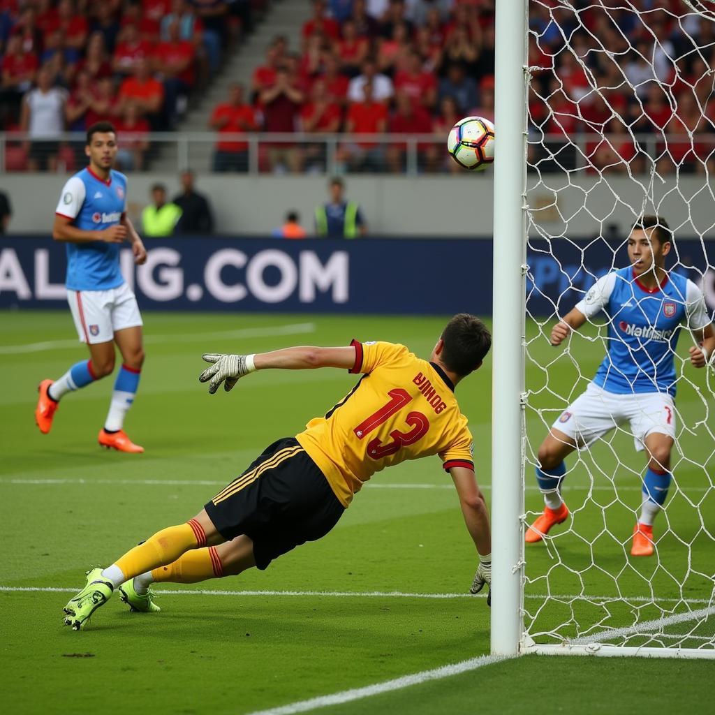 Bui Tien Dung makes a crucial penalty save