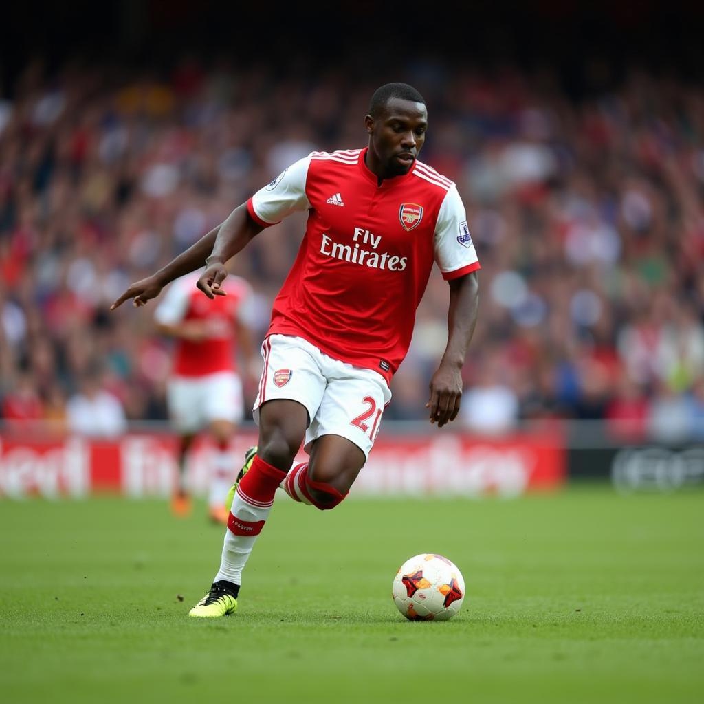 Emmanuel Eboue playing for Arsenal