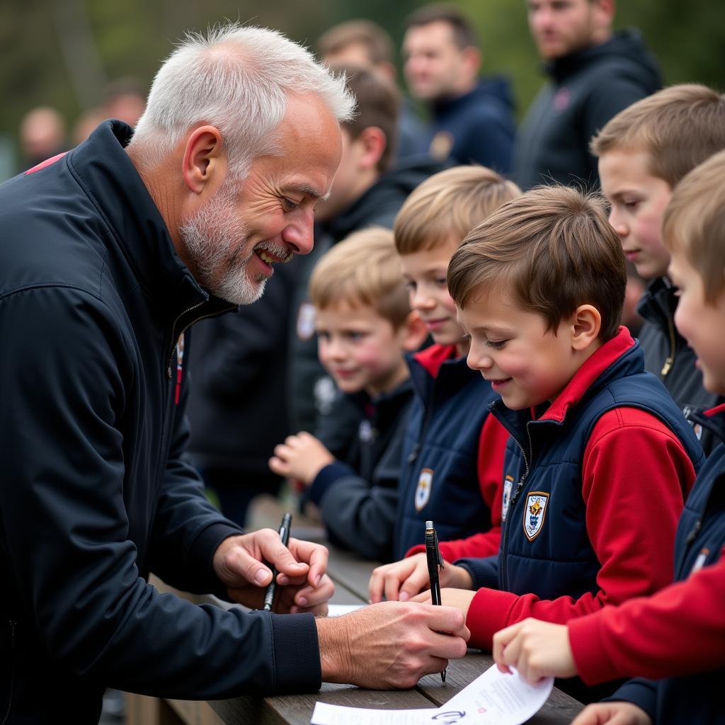 Erling Haaland interacting with young fans