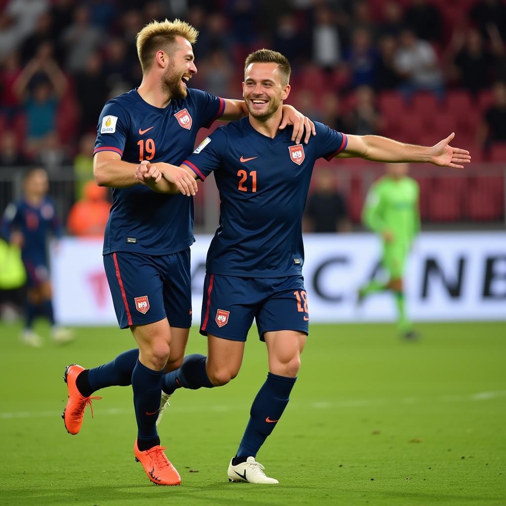 Haaland and De Bruyne celebrating a goal