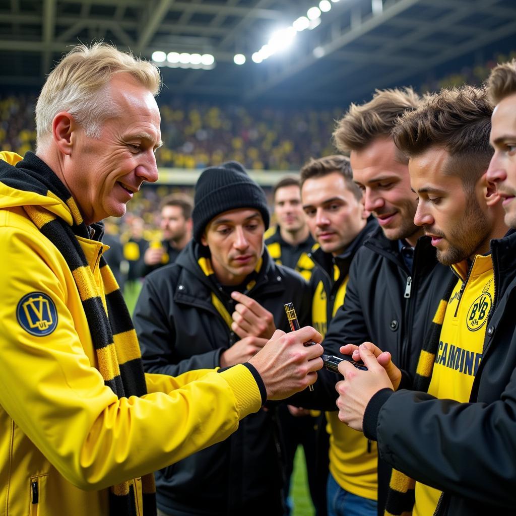 Erling Haaland interacting with Borussia Dortmund fans