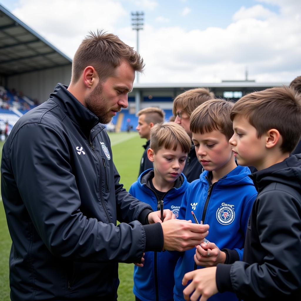 Haaland interacts with Genk fans.