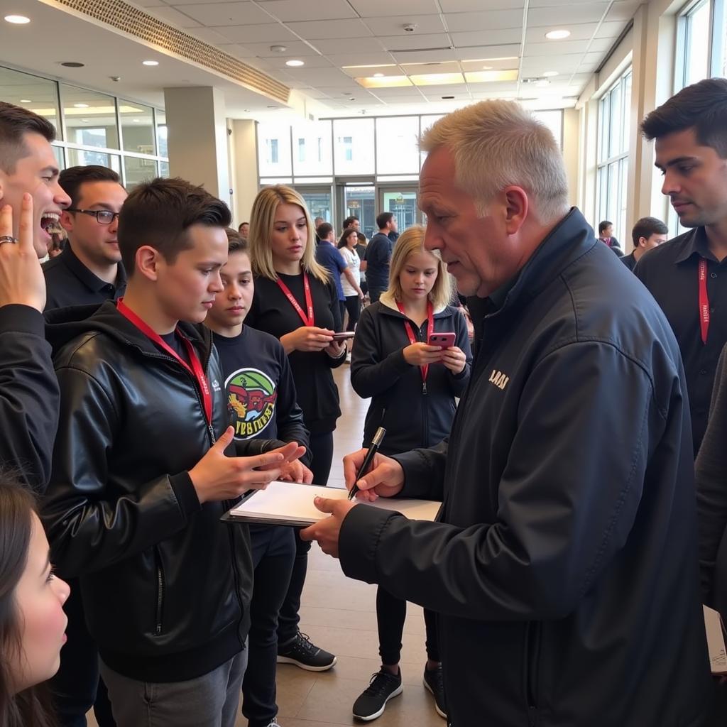 Erling Haaland interacting with young fans after a match