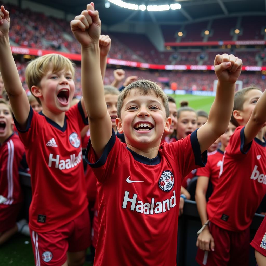 Haaland Kids Jersey Popularity: A photo depicting a group of children wearing Haaland jerseys, cheering enthusiastically at a football game, showcasing the widespread popularity of the jerseys among young fans.