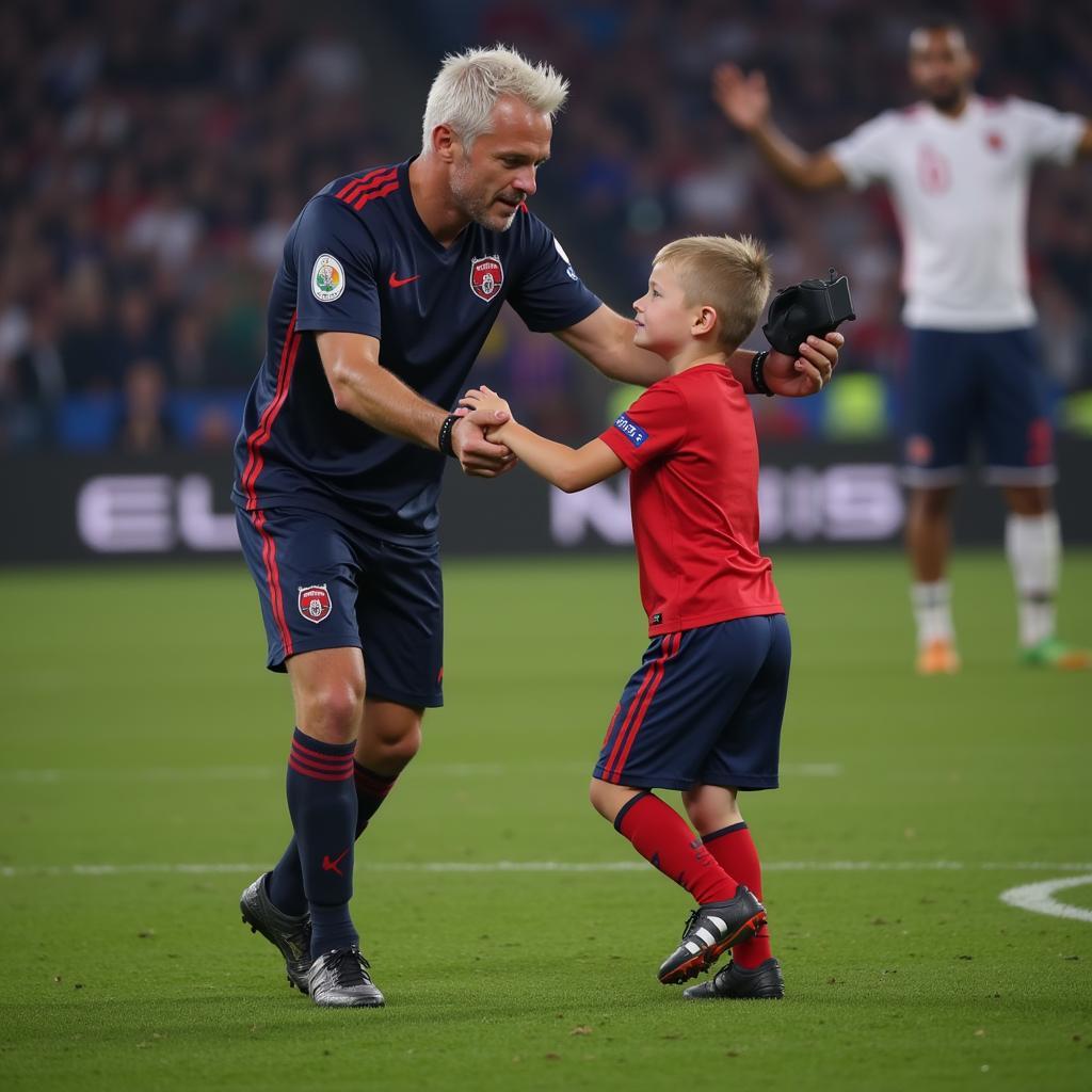 Erling Haaland taking a selfie with a pitch invader