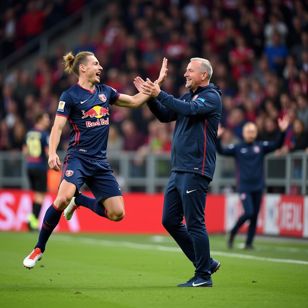 Haaland and Rangnick celebrating a goal at Salzburg