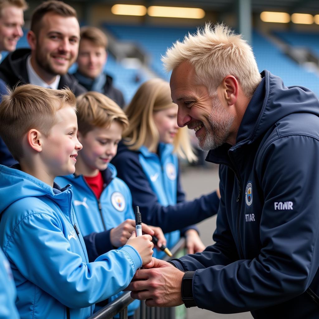 Haaland signing autographs for Man City Fans