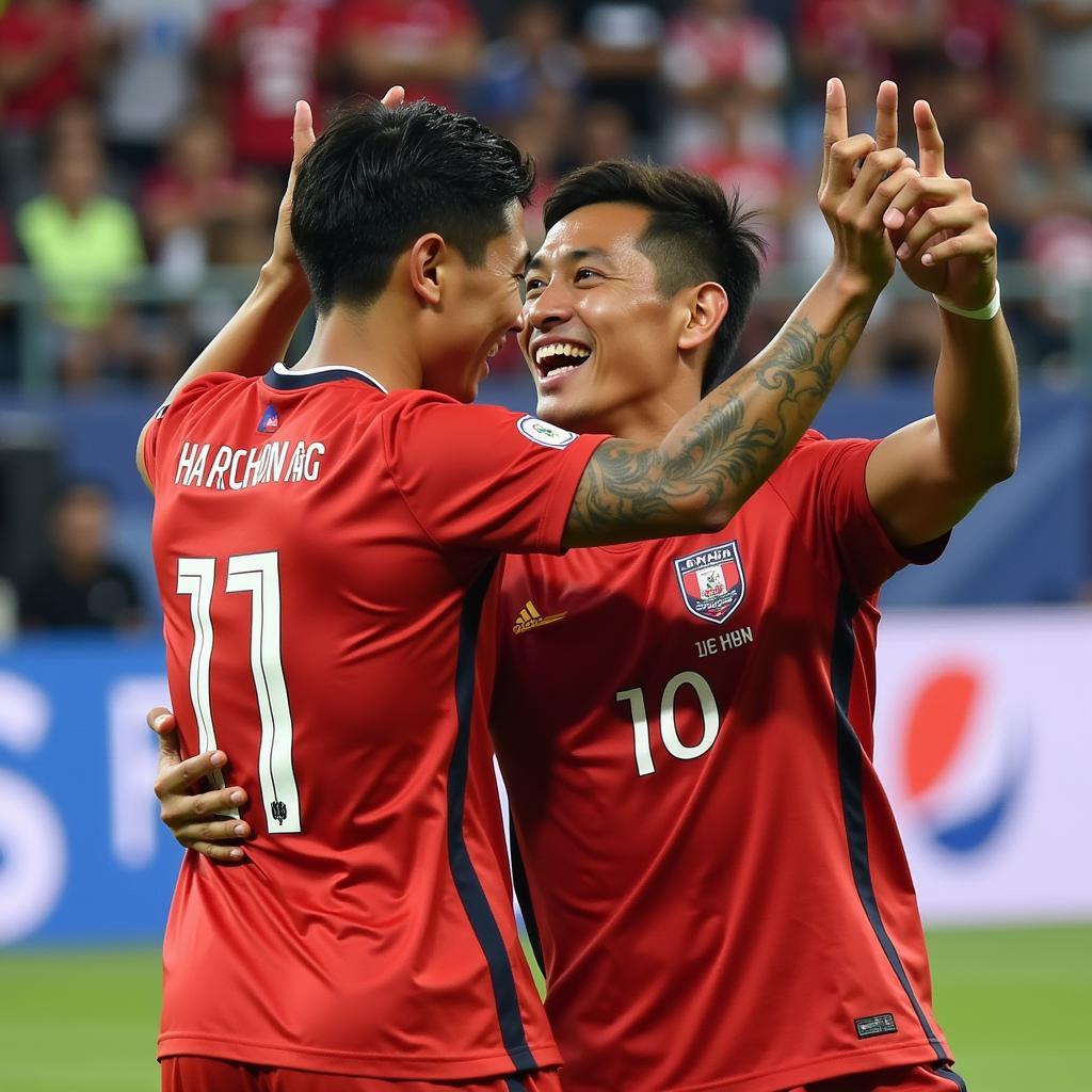 Hai Phong players celebrating a goal with a classic embrace