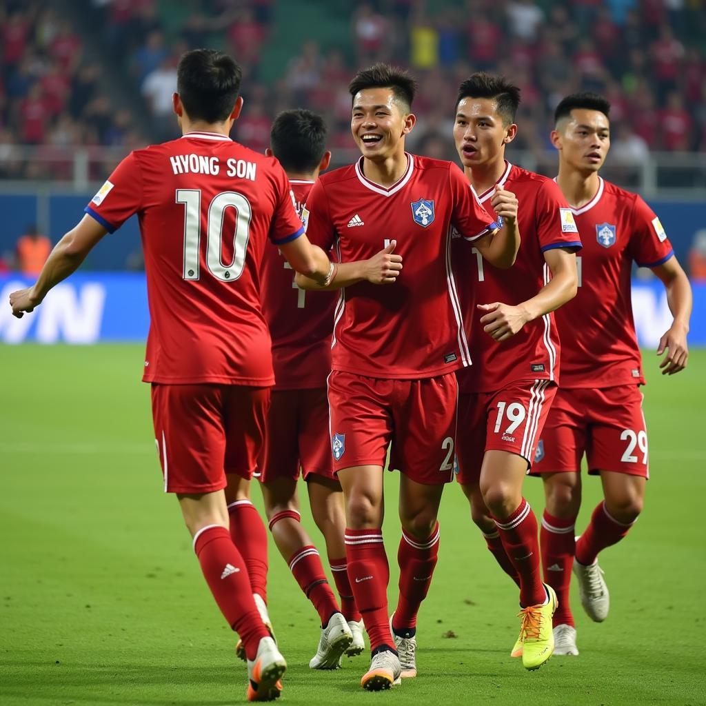 Nguyen Hong Son U19 celebrating a goal with his teammates.