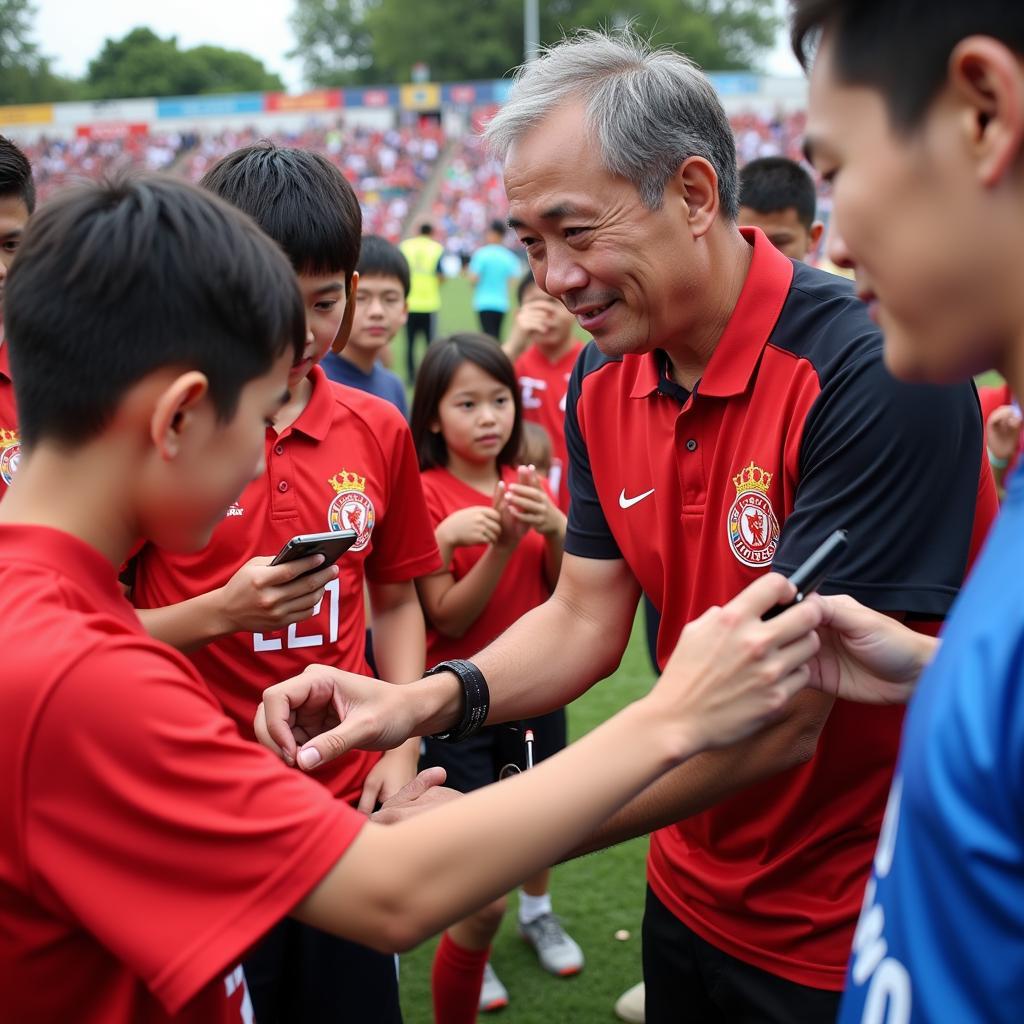 Nguyen Ngoc Hai interacting with young fans