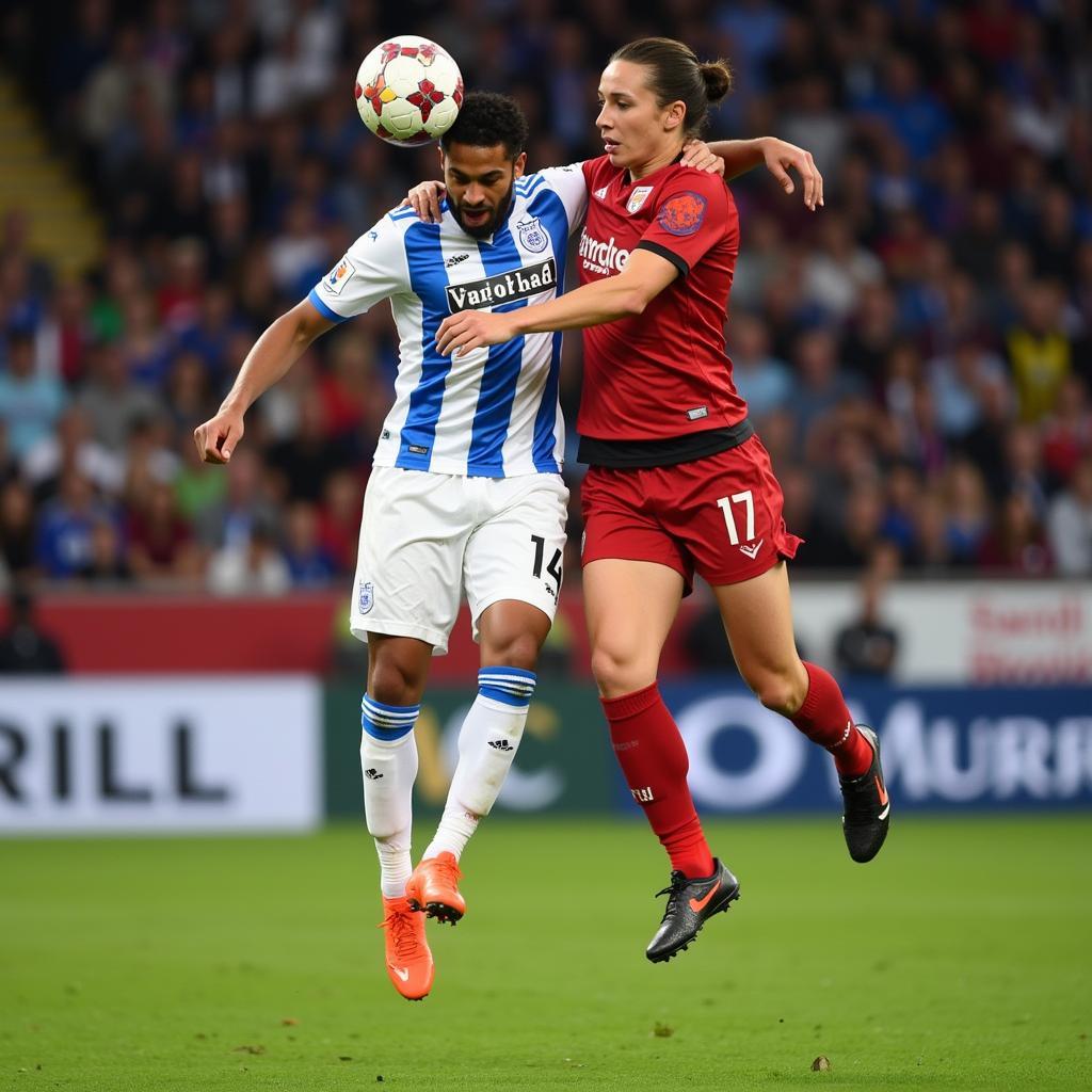 Nunez and Haaland contesting a header