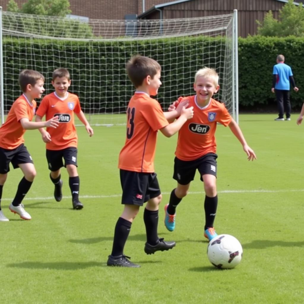 Tiny Footballers celebrating a goal in Episode 10