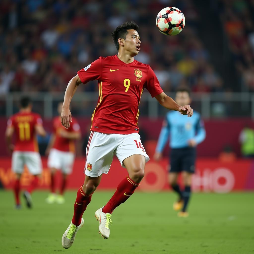 U23 Vietnam player jumping high to head the ball during a match.